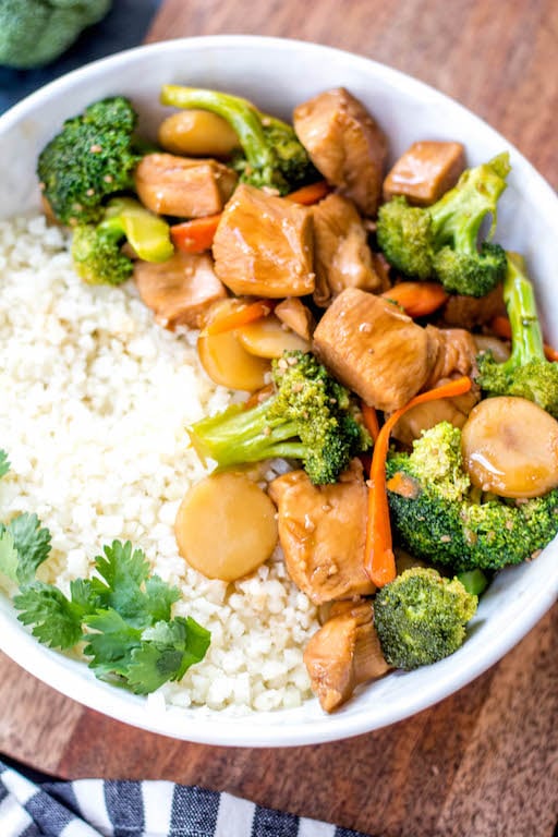 This Paleo and Whole30 instant pot chicken broccoli stir fry is a great weeknight dinner made in one pot and in under 30 minutes. It’s not only a Whole30 instant pot recipe, but it's low carb and gluten-free, so you can enjoy a guilt free Chinese inspired meal or make a healthy meal prep recipe that will ensure delicious leftovers all week. #whole30instantpot #whole30stirfry #paleoinstantpot #whole30chickenrecipes #ketoinstantpot