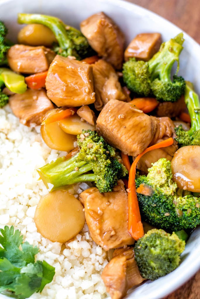 This Paleo and Whole30 instant pot broccoli chicken stir fry is a great weeknight dinner made in one pot and in under 30 minutes. It’s not only a Whole30 instant pot recipe, but it's low carb and gluten-free, so you can enjoy a guilt free Chinese inspired meal or make a healthy meal prep recipe that will ensure delicious leftovers all week. #whole30instantpot #whole30stirfry #paleoinstantpot #whole30chickenrecipes #ketoinstantpot