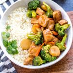 This Paleo and Whole30 instant pot chicken broccoli stir fry is a great weeknight dinner made in one pot and in under 30 minutes. It’s not only a Whole30 instant pot recipe, but it's low carb and gluten-free, so you can enjoy a guilt free Chinese inspired meal or make a healthy meal prep recipe that will ensure delicious leftovers all week. #whole30instantpot #whole30stirfry #paleoinstantpot #whole30chickenrecipes #ketoinstantpot