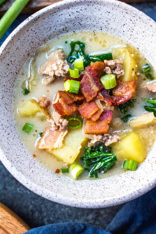 Whole30 Zuppa Toscana is one of my favorite meals to make in my instant pot on a cold, wintery day. It’s rich, creamy, and tastes authentic while remaining Paleo and gluten-free. Double the batch for you and your family and enjoy this healthy Whole30 soup for lunches or dinners for the week. #whole30instantpot #instantpotzuppatoscana #whole30instantpotzuppatoscana #paleozuppatoscana #whole30soup #paleosoup