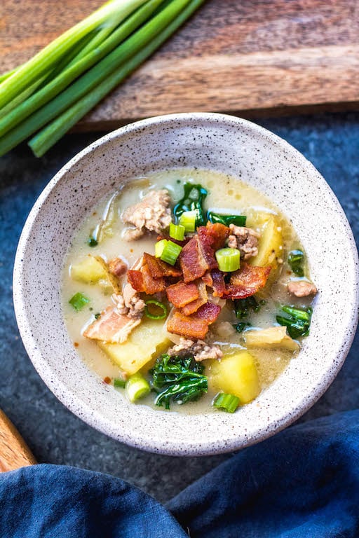 Whole30 Zuppa Toscana is one of my favorite meals to make in my instant pot on a cold, wintery day. It’s rich, creamy, and tastes authentic while remaining Paleo and gluten-free. Double the batch for you and your family and enjoy this healthy Whole30 soup for lunches or dinners for the week. #whole30instantpot #instantpotzuppatoscana #whole30instantpotzuppatoscana #paleozuppatoscana #whole30soup #paleosoup