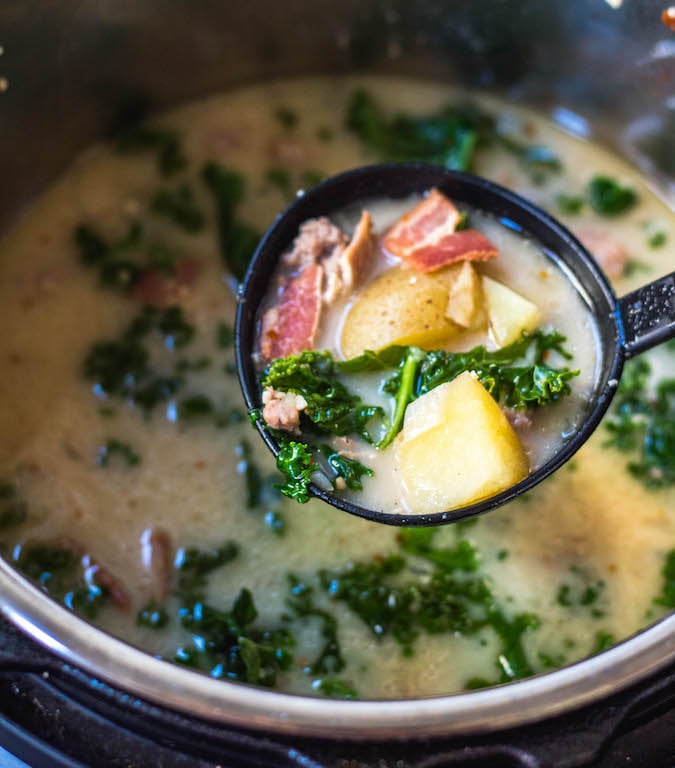 Whole30 Zuppa Toscana is one of my favorite meals to make in my instant pot on a cold, wintery day. It’s rich, creamy, and tastes authentic while remaining Paleo and gluten-free. Double the batch for you and your family and enjoy this healthy Whole30 soup for lunches or dinners for the week. #whole30instantpot #instantpotzuppatoscana #whole30instantpotzuppatoscana #paleozuppatoscana #whole30soup #paleosoup