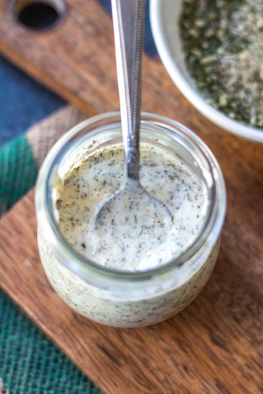 This Whole30 homemade ranch dressing is so easy to make at home. It's a paleo, keto, dairy-free and gluten-free DIY condiment that is perfect for dipping, drizzling or adding to a number of recipes. It takes under 5 minutes to whip together so it's a great addition to your meal prep to keep for the week ahead and is a healthy, budget-friendly alternative to store bought ranch. #whole30ranchdressing #whole30homemadedressing #ketoranch #paleoranch #dairyfreeranch