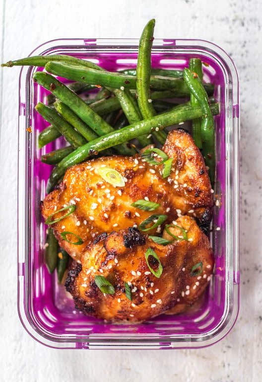 This Whole30 Asian chicken thighs and spicy green beans recipe is ideal for a lunch meal prep recipe, or a healthy, paleo weeknight dinner. The sticky Asian marinade is full of flavor and so easy to prepare. With the green bean side, you’ll have a low carb and delicious meal in under 30 minutes! #whole30chickenrecipes #whole30mealprep #paleochickenrecipes #paleomealprep #ketochickenrecipes