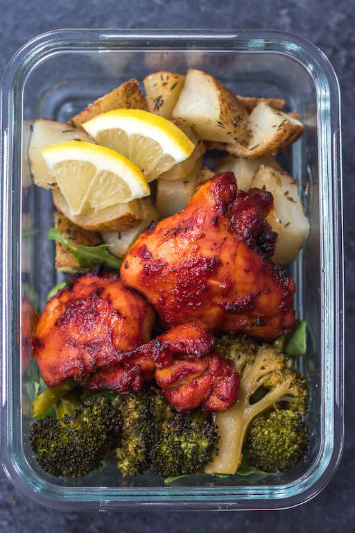 This Whole30 sheet pan BBQ chicken thighs and roasted vegetables recipe is perfect for healthy meal prep, or an easy paleo, gluten-free weeknight dinner. It doesn’t get much more simple than only using one pan, having no clean up but ending up with plenty of meal prep for the week that has tons of flavor! #whole30sheetpan #paleosheetpan #whole30mealprep #whole30bbqchicken