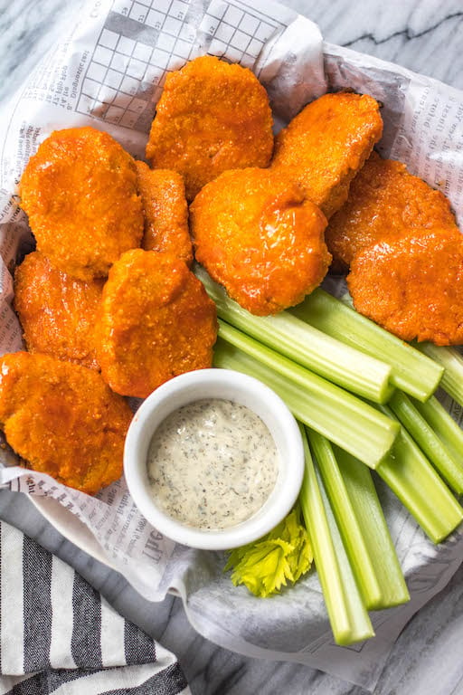 These buffalo chicken nuggets are the best easy and healthy weeknight dinner or meal prep idea. They're Whole30, Paleo, gluten-free, low carb and perfect for lunch, dinner, appetizers and even chopped up to make a buffalo chicken salad! It's a simple Whole30 ground chicken recipe that only takes a few ingredients and a few minutes in the oven! #whole30chickenrecipes #whole30groundchicken #whole30buffalo #paleochicken #glutenfree