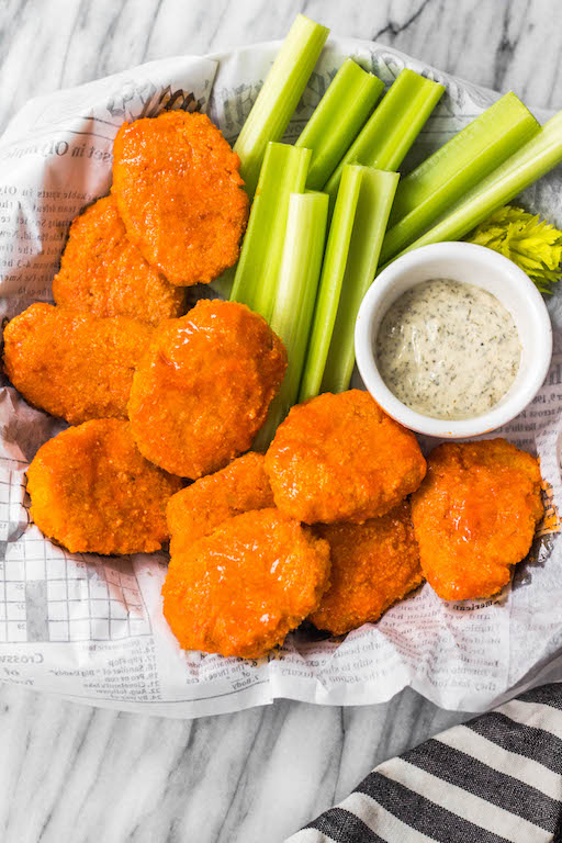 These buffalo chicken nuggets are the best easy and healthy weeknight dinner or meal prep idea. They're Whole30, Paleo, gluten-free, low carb and perfect for lunch, dinner, appetizers and even chopped up to make a buffalo chicken salad! It's a simple Whole30 ground chicken recipe that only takes a few ingredients and a few minutes in the oven! #whole30chickenrecipes #whole30groundchicken #whole30buffalo #paleochicken #glutenfree