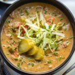 This Whole30 slow cooker cheeseburger soup might be dairy-free, but you won't notice with how creamy and full of flavor it is. It's an easy weeknight dinner to toss in the crock pot, or a simple paleo and gluten-free recipe to meal prep for the week because the leftovers are so delicious! Using ground beef and tons of vegetables, this Whole30 soup is sure to be a new favorite! #whole30slowcooker #whole30soup #whole30cheeseburgersoup #whole30groundbeef