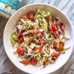 This easy BLT coleslaw is a light and flavorful side dish. It's Whole30, paleo, keto and gluten-free, all while not skimping on flavor. Creamy and healthy, the bacon and extra veggies added into this family favorite recipe are sure to be a hit! #whole30recipes #whole30sidedish #ketorecipes #lowcarb #coleslaw #ketobaconrecipes #paleorecipes