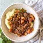 This slow cooker beef ragu is the perfect cozy and hearty weeknight meal or meal prep recipe that's not only Whole30, paleo, and gluten-free, but it is incredibly delicious. It's loaded with vegetables, easy to prepare and takes almost no hands-on cooking time thanks to the crock pot. It also freezes really well! This is sure to be a family favorite, and a go-to recipe when you need a quick meal to be ready for dinner. #whole30slowcooker #whole30recipes #paleoslowcooker #slowcookerbeefragu #whole30beef #bestwhole30recipes #whole30weeknight