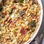 This creamy dijon chicken casserole is an easy and delicious Whole30, Paleo, gluten-free recipe that's great for a weeknight dinner or a simple and healthy meal prep recipe. There's lots of vegetables, bacon and a flavorful dairy-free cream sauce loaded into one casserole dish, and baked to perfection. #whole30recipes #whole30casseroles #paleocasseroles #glutenfreecasseroles #whole30chickenrecipes #easywhole30recipes #mealprep