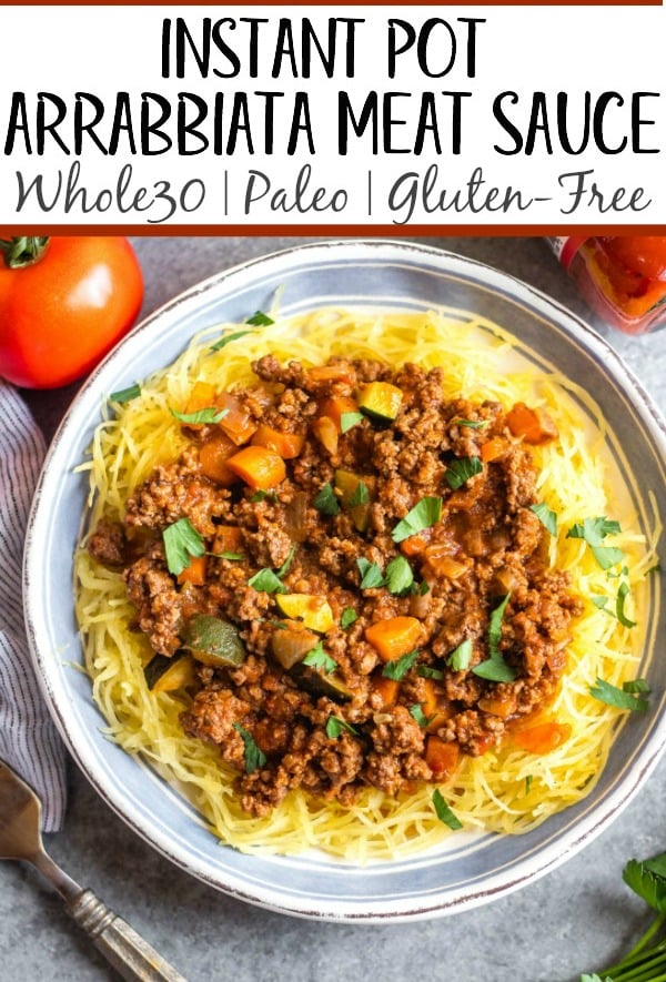 This Whole30 arrabbiata meat sauce with vegetables is made in the instant pot, so everything is cooked in one pot! Made with ground beef and with lots of vegetables snuck in, it's a hearty, cozy and healthy recipe that's great for meal prep. It's also gluten-free, Paleo and low carb/keto. This meat sauce is full of flavor and we love that it's freezer friendly, too. #whole30instantpot #whole30beefrecipes #whole30meatsauce #groundbeefrecipes #paleobeef