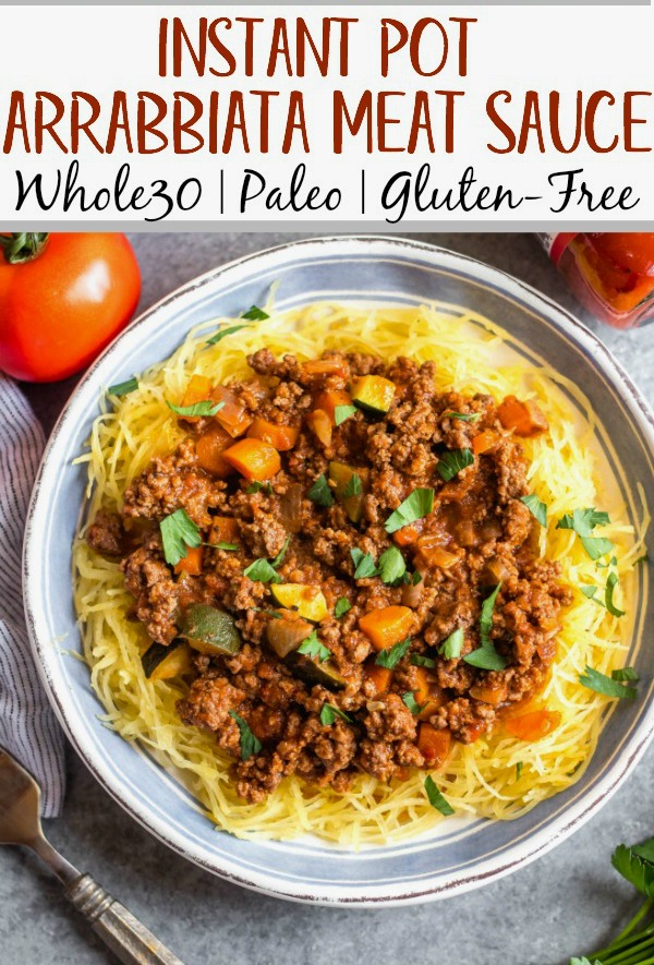 This Whole30 arrabbiata meat sauce with vegetables is made in the instant pot, so everything is cooked in one pot! Made with ground beef and with lots of vegetables snuck in, it's a hearty, cozy and healthy recipe that's great for meal prep. It's also gluten-free, Paleo and low carb/keto. This meat sauce is full of flavor and we love that it's freezer friendly, too. #whole30instantpot #whole30beefrecipes #whole30meatsauce #groundbeefrecipes #paleobeef