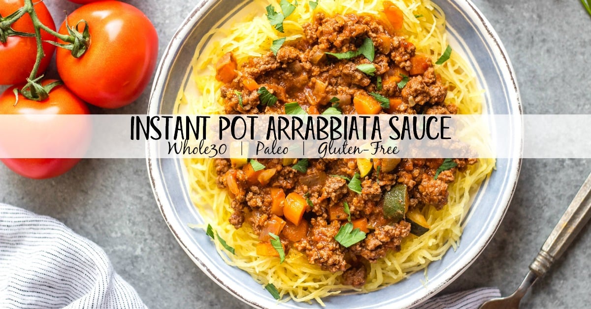 This Whole30 arrabbiata meat sauce with vegetables is made in the instant pot, so everything is cooked in one pot! Made with ground beef and with lots of vegetables snuck in, it's a hearty, cozy and healthy recipe that's great for meal prep. It's also gluten-free, Paleo and low carb/keto. This meat sauce is full of flavor and we love that it's freezer friendly, too. #whole30instantpot #whole30beefrecipes #whole30meatsauce #groundbeefrecipes #paleobeef