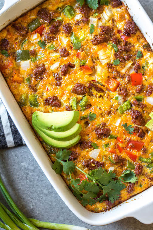 This Whole30 chorizo egg bake is a really simple yet delicious breakfast casserole that is paleo, gluten-free and dairy-free. It can easily be made low carb, and is freezer friendly, too! It doesn't take long to prepare, and is a healthy and easy way to spice up your breakfast routine or meal prep. Packed with vegetables like peppers and hash browns, this is a filling meal that you'll look forward to! #whole30breakfast #whole30casserole #chorizorecipes #whole30pork #whole30mealprep #glutenfreebreakfast