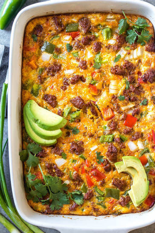 This Whole30 chorizo egg bake is a really simple yet delicious breakfast casserole that is paleo, gluten-free and dairy-free. It can easily be made low carb, and is freezer friendly, too! It doesn't take long to prepare, and is a healthy and easy way to spice up your breakfast routine or meal prep. Packed with vegetables like peppers and hash browns, this is a filling meal that you'll look forward to! #whole30breakfast #whole30casserole #chorizorecipes #whole30pork #whole30mealprep #glutenfreebreakfast