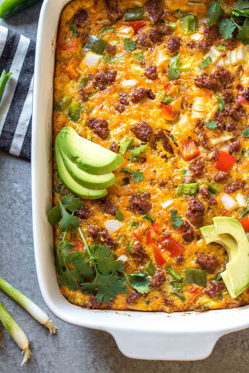 This Whole30 chorizo egg bake is a really simple yet delicious breakfast casserole that is paleo, gluten-free and dairy-free. It can easily be made low carb, and is freezer friendly, too! It doesn't take long to prepare, and is a healthy and easy way to spice up your breakfast routine or meal prep. Packed with vegetables like peppers and hash browns, this is a filling meal that you'll look forward to! #whole30breakfast #whole30casserole #chorizorecipes #whole30pork #whole30mealprep #glutenfreebreakfast