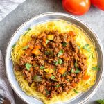 This Whole30 arrabbiata meat sauce with vegetables is made in the instant pot, so everything is cooked in one pot! Made with ground beef and with lots of vegetables snuck in, it's a hearty, cozy and healthy recipe that's great for meal prep. It's also gluten-free, Paleo and low carb/keto. This meat sauce is full of flavor and we love that it's freezer friendly, too. #whole30instantpot #whole30beefrecipes #whole30meatsauce #groundbeefrecipes #paleobeef