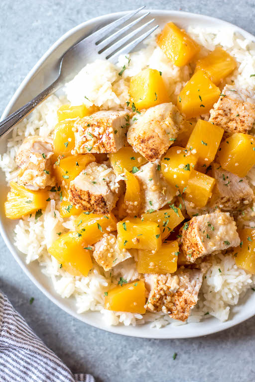 This Whole30 slow cooker pineapple pork only uses a few simple ingredients paired with a pork loin, and a crock pot to create an easy family-friendly weeknight meal or a quick meal prep recipe. It’s so full of flavor, while also being Paleo, gluten-free and dairy-free. This healthy recipe in the slow cooker really couldn’t be easier! #whole30slowcooker #whole30porkloin #paleoslowcooker #whole30crockpot #glutenfreepork #whole30mealprep