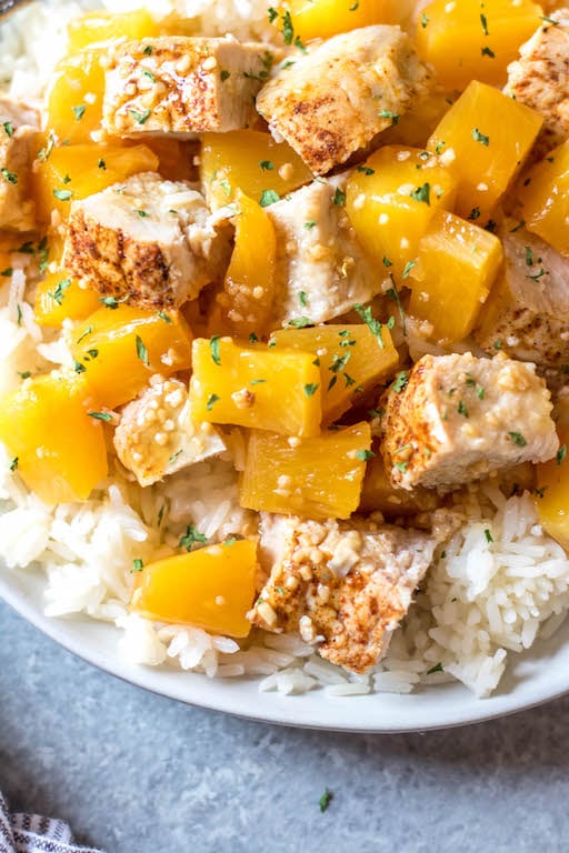 This Whole30 slow cooker pineapple pork only uses a few simple ingredients paired with a pork loin, and a crock pot to create an easy family-friendly weeknight meal or a quick meal prep recipe. It’s so full of flavor, while also being Paleo, gluten-free and dairy-free. This healthy recipe in the slow cooker really couldn’t be easier! #whole30slowcooker #whole30porkloin #paleoslowcooker #whole30crockpot #glutenfreepork #whole30mealprep