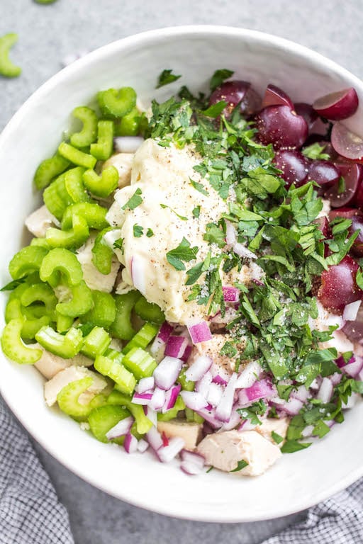 This classic chicken salad is an easy meal prep recipe that's Whole30, Paleo, gluten-free and low carb! It's made with grapes, celery and mayo and only a few other simple ingredients, making it a quick option to throw together, and is a great way to use leftover chicken. It's perfect for storing in the fridge and enjoying over greens for lunches, for a gathering, or a family meal that takes under 30 minutes to make! #whole30recipes #whole30chickensalad #classicchickensalad #ketochickensalad #lowcarbchicken #whole30chickenrecipes #chickensaladwithgrapes