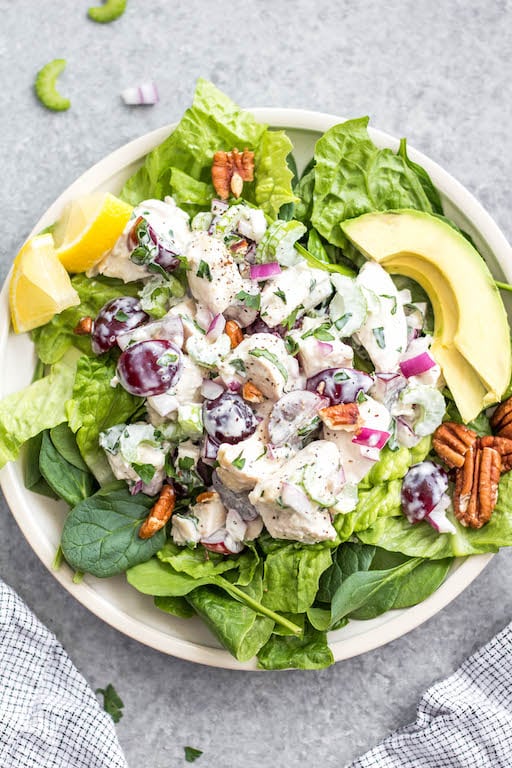 This classic chicken salad is an easy meal prep recipe that's Whole30, Paleo, gluten-free and low carb! It's made with grapes, celery and mayo and only a few other simple ingredients, making it a quick option to throw together, and is a great way to use leftover chicken. It's perfect for storing in the fridge and enjoying over greens for lunches, for a gathering, or a family meal that takes under 30 minutes to make! #whole30recipes #whole30chickensalad #classicchickensalad #ketochickensalad #lowcarbchicken #whole30chickenrecipes #chickensaladwithgrapes