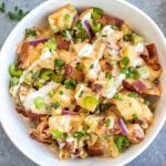 This Whole30 buffalo ranch potato salad recipe is a healthy, easy side dish or vegetable recipe that's a perfect addition to any meal or gathering. It's full of flavor from the sauces, bacon, golden potatoes, onion and celery, while being dairy-free, gluten-free and Paleo. It's a family friendly recipe that is also great for meal prep to pair with a protein and eat all week long. #whole30potato #buffalo #ranchrecipes #whole30potatosalad #bacon #whole30vegetablerecipes
