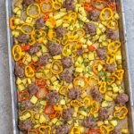 This easy sheet pan sausage breakfast recipe is a healthy meal prep recipe that's only 5 ingredients! The breakfast sausage is paired with seasoned potatoes and peppers all on one pan, put into the oven and ready to go with very little hands-on time. It's also great for a weeknight dinner for a simple vegetable and protein meal. This is a quick Whole30, paleo, gluten-free and egg-free breakfast recipe the whole family will enjoy! #whole30breakfast #whole30sheetpan #sheetpanbreakfast #glutenfree #eggfree #paleobreakfast