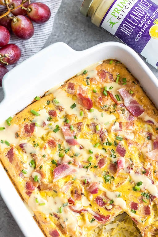 This Eggs Benedict Casserole is a spin on the traditional dish, but with no gluten, grain or dairy! It's a way to enjoy the taste of eggs benedict you love in an egg bake form, which is perfect for meal prep or a family breakfast or brunch. This Whole30 and paleo recipe is easy to whip together and only requires a few minutes of hands on cooking time. #whole30breakfast #whole30eggbake #breakfastcasserole #eggsbenedict #paleobreakfast