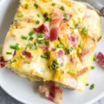 This Eggs Benedict Casserole is a spin on the traditional dish, but with no gluten, grain or dairy! It's a way to enjoy the taste of eggs benedict you love in an egg bake form, which is perfect for meal prep or a family breakfast or brunch. This Whole30 and paleo recipe is easy to whip together and only requires a few minutes of hands on cooking time. #whole30breakfast #whole30eggbake #breakfastcasserole #eggsbenedict #paleobreakfast