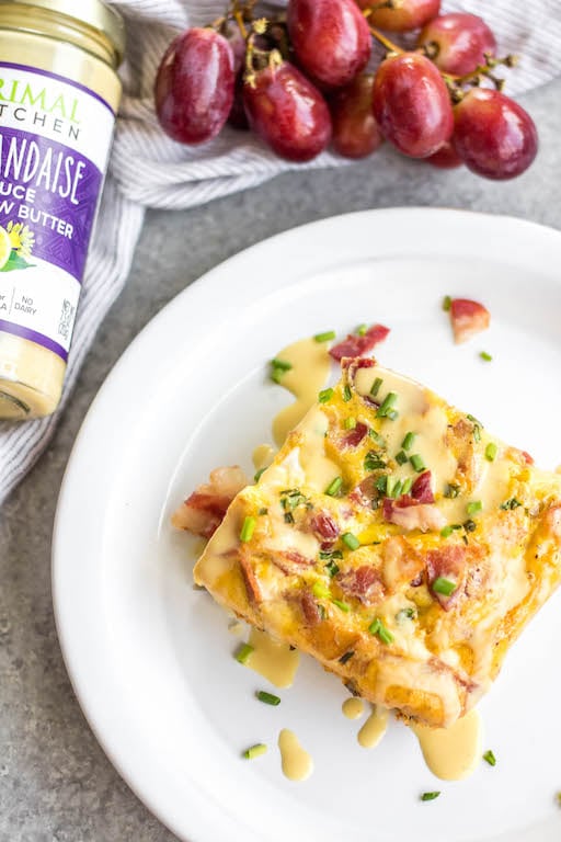 This Eggs Benedict Casserole is a spin on the traditional dish, but with no gluten, grain or dairy! It's a way to enjoy the taste of eggs benedict you love in an egg bake form, which is perfect for meal prep or a family breakfast or brunch. This Whole30 and paleo recipe is easy to whip together and only requires a few minutes of hands on cooking time. #whole30breakfast #whole30eggbake #breakfastcasserole #eggsbenedict #paleobreakfast