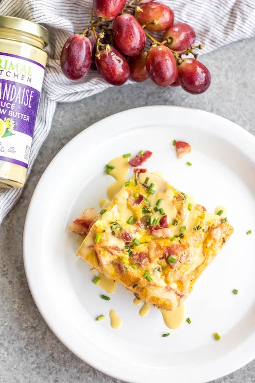 This Eggs Benedict Casserole is a spin on the traditional dish, but with no gluten, grain or dairy! It's a way to enjoy the taste of eggs benedict you love in an egg bake form, which is perfect for meal prep or a family breakfast or brunch. This Whole30 and paleo recipe is easy to whip together and only requires a few minutes of hands on cooking time. #whole30breakfast #whole30eggbake #breakfastcasserole #eggsbenedict #paleobreakfast