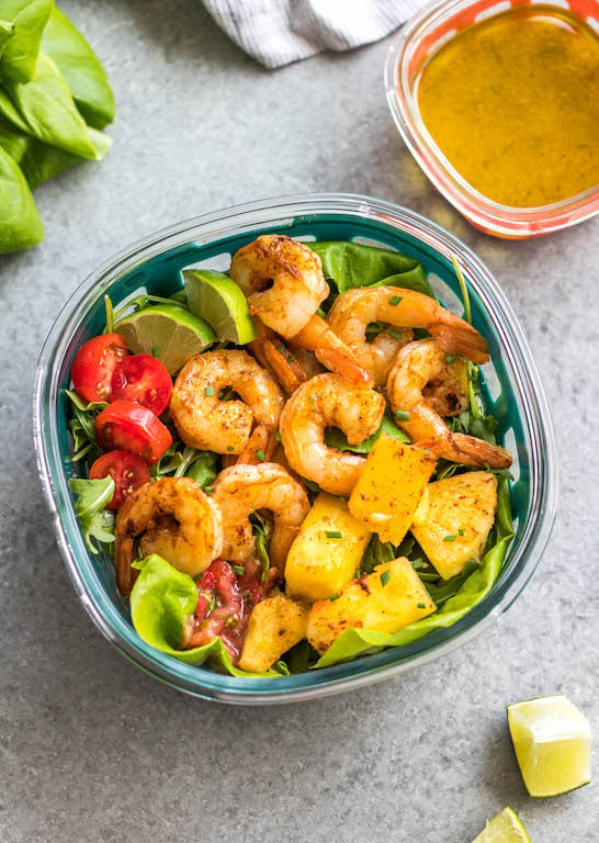 This spicy shrimp salad with homemade lime dressing is great for a healthy lunch meal prep or simple dinner. The shrimp cooks quickly and the dressing only takes a few minutes to prepare, so it all comes together in under 30 minutes. It’s also all Whole30, paleo, low carb and paleo, while being full of flavor and super easy! #whole30shrimp #whole30salad #shrimpsalad #paleoshrimp #shrimprecipes