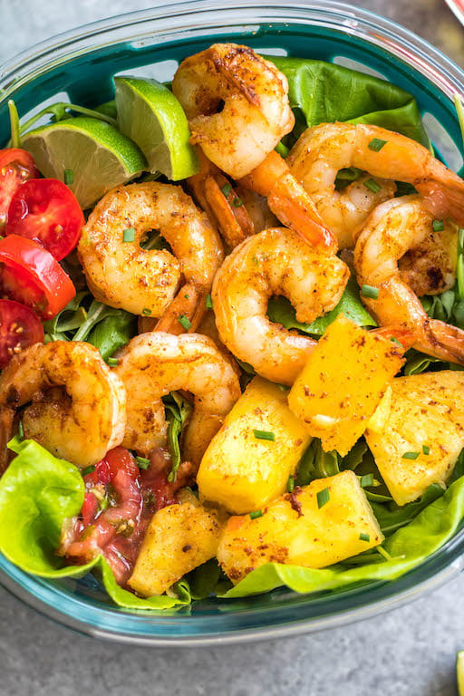 This spicy shrimp salad with homemade lime dressing is great for a healthy lunch meal prep or simple dinner. The shrimp cooks quickly and the dressing only takes a few minutes to prepare, so it all comes together in under 30 minutes. It’s also all Whole30, paleo, low carb and paleo, while being full of flavor and super easy! #whole30shrimp #whole30salad #shrimpsalad #paleoshrimp #shrimprecipes