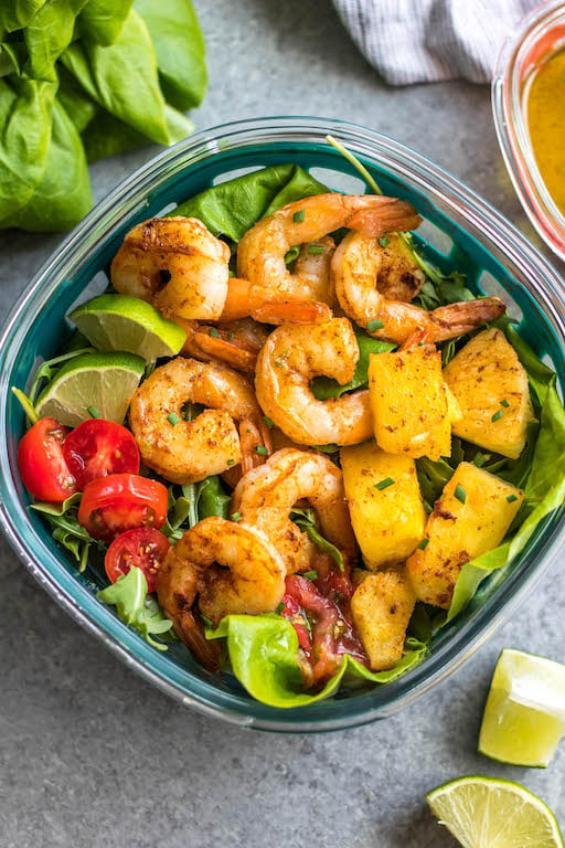 This spicy shrimp salad with homemade lime dressing is great for a healthy lunch meal prep or simple dinner. The shrimp cooks quickly and the dressing only takes a few minutes to prepare, so it all comes together in under 30 minutes. It’s also all Whole30, paleo, low carb and paleo, while being full of flavor and super easy! #whole30shrimp #whole30salad #shrimpsalad #paleoshrimp #shrimprecipes