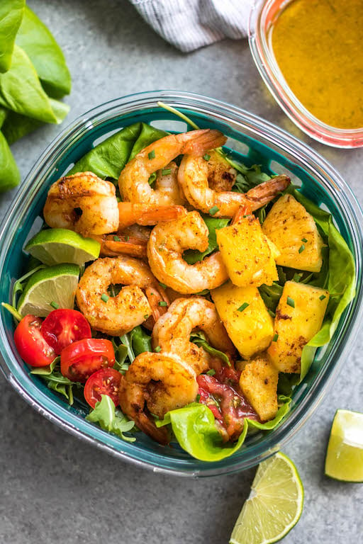 This spicy shrimp salad with homemade lime dressing is great for a healthy lunch meal prep or simple dinner. The shrimp cooks quickly and the dressing only takes a few minutes to prepare, so it all comes together in under 30 minutes. It’s also all Whole30, paleo, low carb and paleo, while being full of flavor and super easy! #whole30shrimp #whole30salad #shrimpsalad #paleoshrimp #shrimprecipes