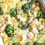 This simple chicken alfredo spaghetti squash casserole is filled with broccoli and onions, and perfect for meal prep or a weeknight chicken dinner recipe. It's Whole30, paleo, keto/low carb, gluten free and dairy free, all while being a delicious, hearty and vegetable-filled meal! It comes together very easily, and reheats well. #whole30chicken #whole30recipes #whole30casserole #lowcarbchicken #paleochicken #chickencasserole #spaghettisquash