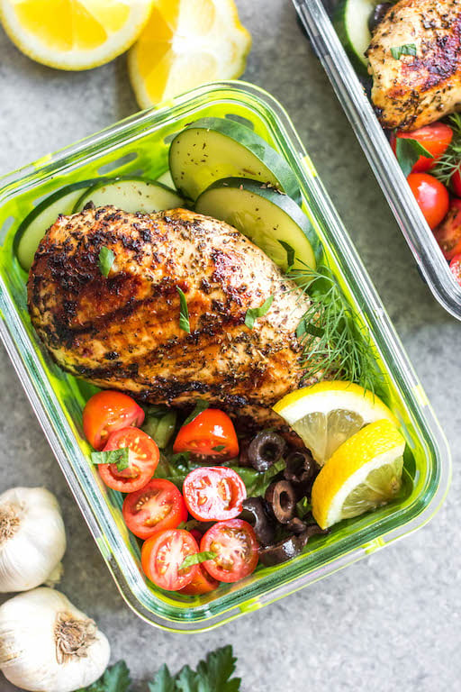 These healthy grilled Greek chicken bowls are perfect for weekday lunches or an easy dinner! Made with only a few simple ingredients, boneless chicken breasts, and fresh vegetables like tomatoes, cucumbers and green pepper, meal prep couldn't be more simple! This grilled chicken is also Whole30, paleo, low carb (keto), and gluten-free. #grilledchicken #whole30greekchicken #paleochicken #ketogrilling #mealprep