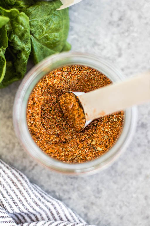 This homemade taco seasoning is an easy DIY way to keep a healthy, sugar-free taco spice mix on hand and ready when you need it. It's Whole30, paleo, low carb and gluten-free, which means anyone you're having taco night with will enjoy! This taco seasoning recipe is mild and family friendly, with the ability to spice it up if you want! Keep this in your pantry for a quick way to add flavor to ground beef, as a dry rub on grilled meat, in fajitas, casseroles and more! #homemadetacoseasoning #whole30tacoseasoning #whole30taco #ketotaco #tacorecipes #tacomeat