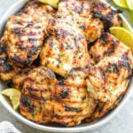 This easy mayo marinated grilled chicken thighs recipe is such a tasty way to grill an easy weeknight dinner or use for a meal prep recipe! This is the best mayo chicken marinade, and leaves the chicken so juicy and full of flavor. This is also a paleo, low carb, Whole30 chicken recipe so everyone in the family can enjoy it! With only a few simple ingredients and under 20 minutes, this will be your new go-to way to grill thighs. #whole30grill #mayomarinade #mayochicken #chickenmarinade #ketochicken