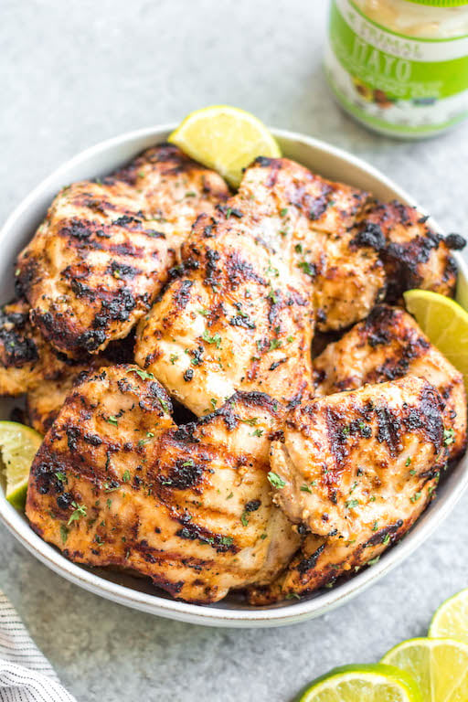 This easy mayo marinated grilled chicken thighs recipe is such a tasty way to grill an easy weeknight dinner or use for a meal prep recipe! This is the best mayo chicken marinade, and leaves the chicken so juicy and full of flavor. This is also a paleo, low carb, Whole30 chicken recipe so everyone in the family can enjoy it! With only a few simple ingredients and under 20 minutes, this will be your new go-to way to grill thighs. #whole30grill #mayomarinade #mayochicken #chickenmarinade #ketochicken