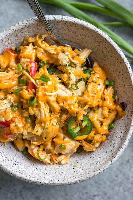 This easy Whole30 jalapeño buffalo chicken casserole is simple to make and full of flavor. It's also full of vegetables, making this a healthy weeknight dinner or meal prep recipe. This is also a keto/low carb, paleo and gluten-free casserole, so everyone in the family will enjoy it! Casseroles are a great way to get dinner on the table, and this Whole30 buffalo chicken casserole is a perfect example! #ketocasserole #whole30casserole #buffalochicken #paleo #whole30chicken