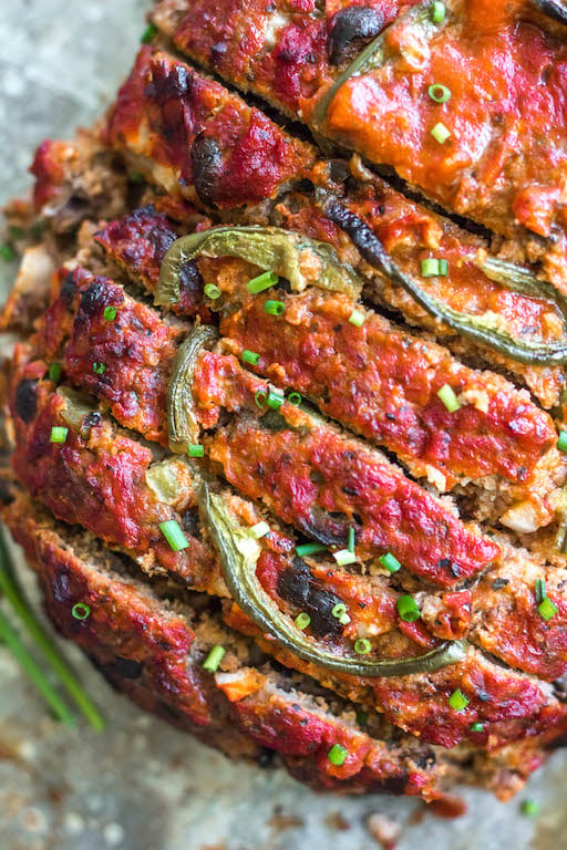 This easy pizza meatloaf recipe is a fun spin on a classic meatloaf. Using a mixture of ground beef and ground pork, and pizza sauce instead of the traditional ketchup, this Whole30 meatloaf recipe is a family-friendly option that's great for meal prep or a simple weeknight dinner. It's also paleo, gluten-free, low carb and freezer friendly. #whole30meatloaf #paleomeatloaf #ketomeatloaf #weeknightdinner #healthyrecipes #whole30groundbeef