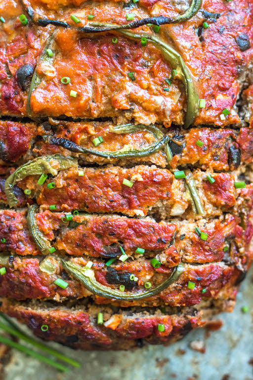 This easy pizza meatloaf recipe is a fun spin on a classic meatloaf. Using a mixture of ground beef and ground pork, and pizza sauce instead of the traditional ketchup, this Whole30 meatloaf recipe is a family-friendly option that's great for meal prep or a simple weeknight dinner. It's also paleo, gluten-free, low carb and freezer friendly. #whole30meatloaf #paleomeatloaf #ketomeatloaf #weeknightdinner #healthyrecipes #whole30groundbeef