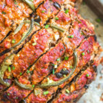 This easy pizza meatloaf recipe is a fun spin on a classic meatloaf. Using a mixture of ground beef and ground pork, and pizza sauce instead of the traditional ketchup, this Whole30 meatloaf recipe is a family-friendly option that's great for meal prep or a simple weeknight dinner. It's also paleo, gluten-free, low carb and freezer friendly. #whole30meatloaf #paleomeatloaf #ketomeatloaf #weeknightdinner #healthyrecipes #whole30groundbeef