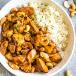 This slow cooker cashew chicken is an easy, healthy dinner or meal prep recipe. It's Whole30, paleo, gluten-free and soy-free, and only needs 10 minutes of prep work to dice chicken and make an easy sauce. The crockpot does the rest of the work, and you get a family friendly meal that's quick and simple to clean up. Paired with a vegetable side, this is the perfect go-to for a busy weeknight! #whole30slowcooker #cashewchicken #whole30chicken #glutenfreechicken #slowcookerrecipes #healthycashewchicken