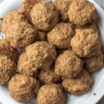 These gluten free vegetarian meatballs are so easy, perfect for meal prep, and only 4 ingredients! In under a half hour, you can have a healthy weeknight dinner or option for affordable, meatless workweek lunches. Made with cauliflower, brown rice and walnuts, they're also soy-free and dairy-free meatballs. These pair perfectly with any sauce, pasta or salad. They also freeze wonderfully, so go ahead and make a double batch! #meatlessrecipes #vegetarianmeatballs #glutenfreevegetarian #soyfreevegetarian #meatlessmeatballs