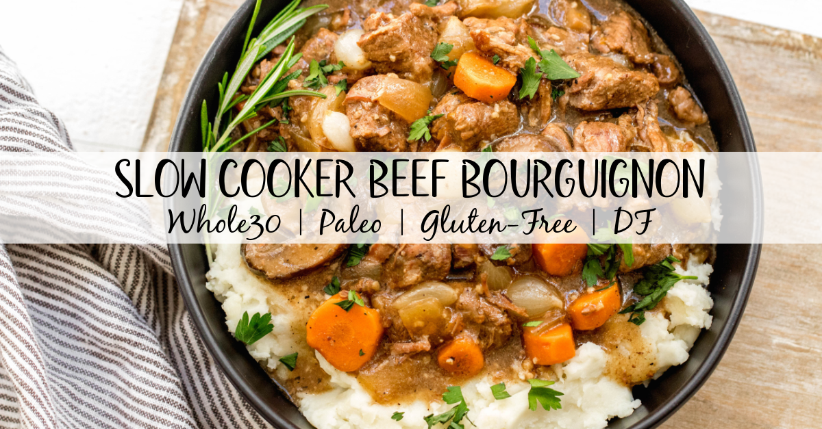 This Whole30 slow cooker beef bourguignon is an easy set it and forget recipe. It's paleo, gluten-free and dairy-free, full of vegetables and rich in flavor. Beef bourguignon in the crockpot is made with stew meat, and is ideal for a simple weeknight dinner or meal prep recipe to use for lunches. It's also freezer friendly, and this Whole30 beef recipe is sure to be a family favorite! #whole30slowcooker #whole30beef