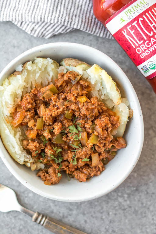 This easy recipe for slow cooker sloppy joes is so simple, but so full of the flavors we know and love! It's perfect for meal prep, easy weeknight meals, family gatherings or football parties, and so much more. The best is that it's Whole30, paleo, gluten-free, and made without sugar so everyone can enjoy! Cooking in the slow cooker makes it great for guests to serve themselves, or to bring to a potluck, and it's a budget friendly ground beef recipe that will be a family favorite! #whole30sloppyjoes #whole30groundbeef #whole30beefrecipes #slowcookerbeef #paleogroundbeef