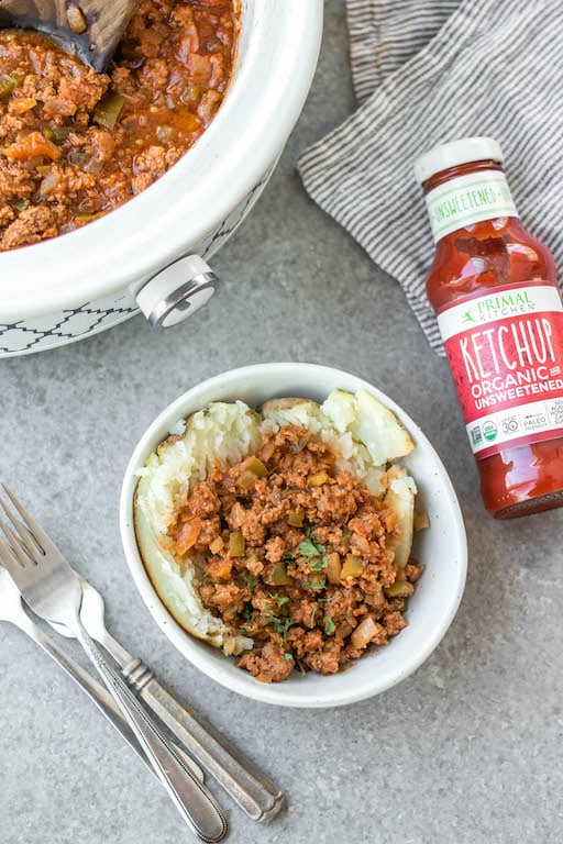 This easy recipe for slow cooker sloppy joes is so simple, but so full of the flavors we know and love! It's perfect for meal prep, easy weeknight meals, family gatherings or football parties, and so much more. The best is that it's Whole30, paleo, gluten-free, and made without sugar so everyone can enjoy! Cooking in the slow cooker makes it great for guests to serve themselves, or to bring to a potluck, and it's a budget friendly ground beef recipe that will be a family favorite! #whole30sloppyjoes #whole30groundbeef #whole30beefrecipes #slowcookerbeef #paleogroundbeef